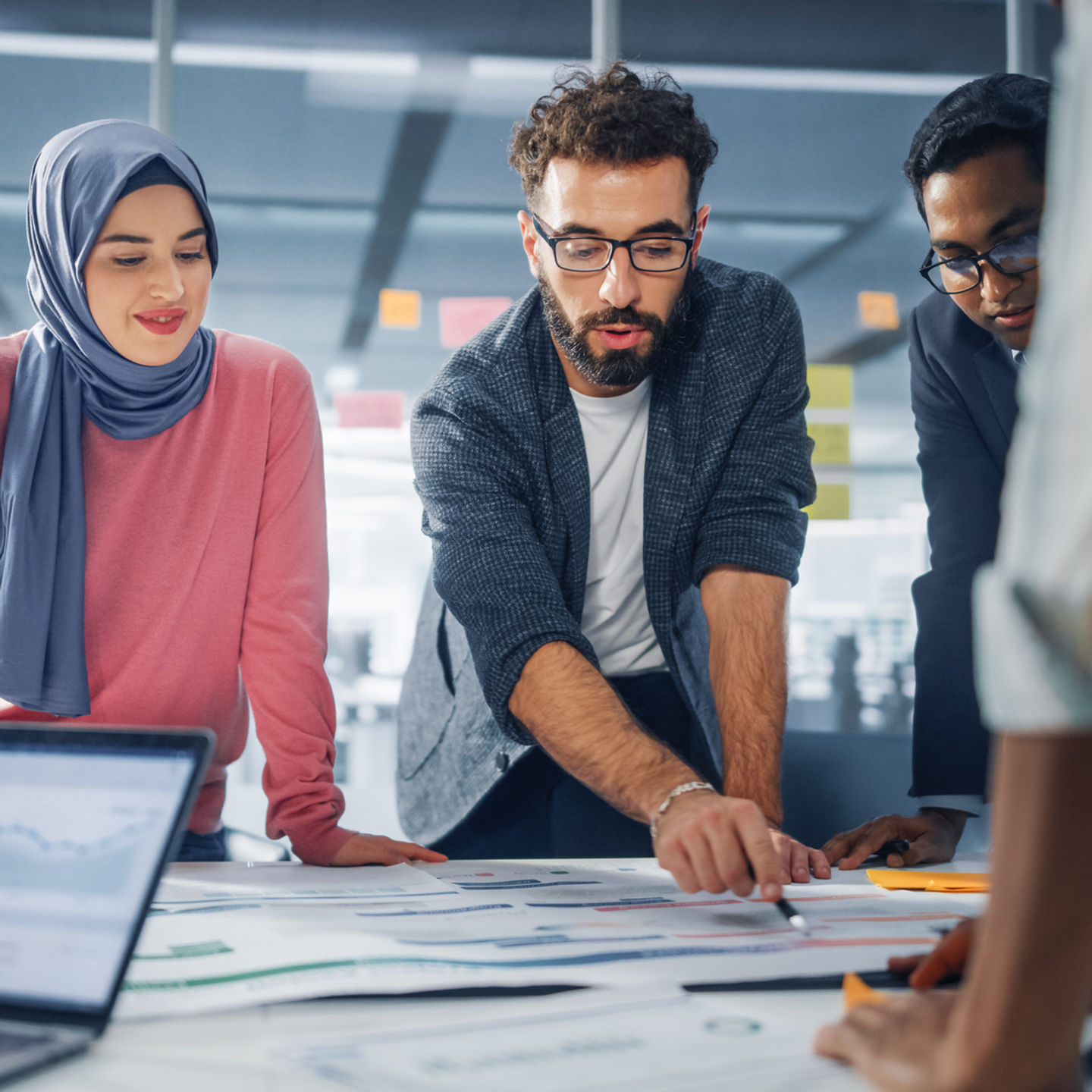 Colleagues in an office meeting — employee relations